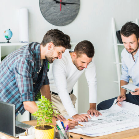 group-male-architect-preparing-blueprint-office